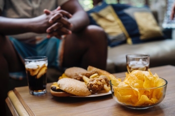 Burger and cola Photo by rawpixel on Unsplash
