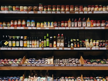 Processed foods on shelves Photo by Daria Volkova on Unsplash